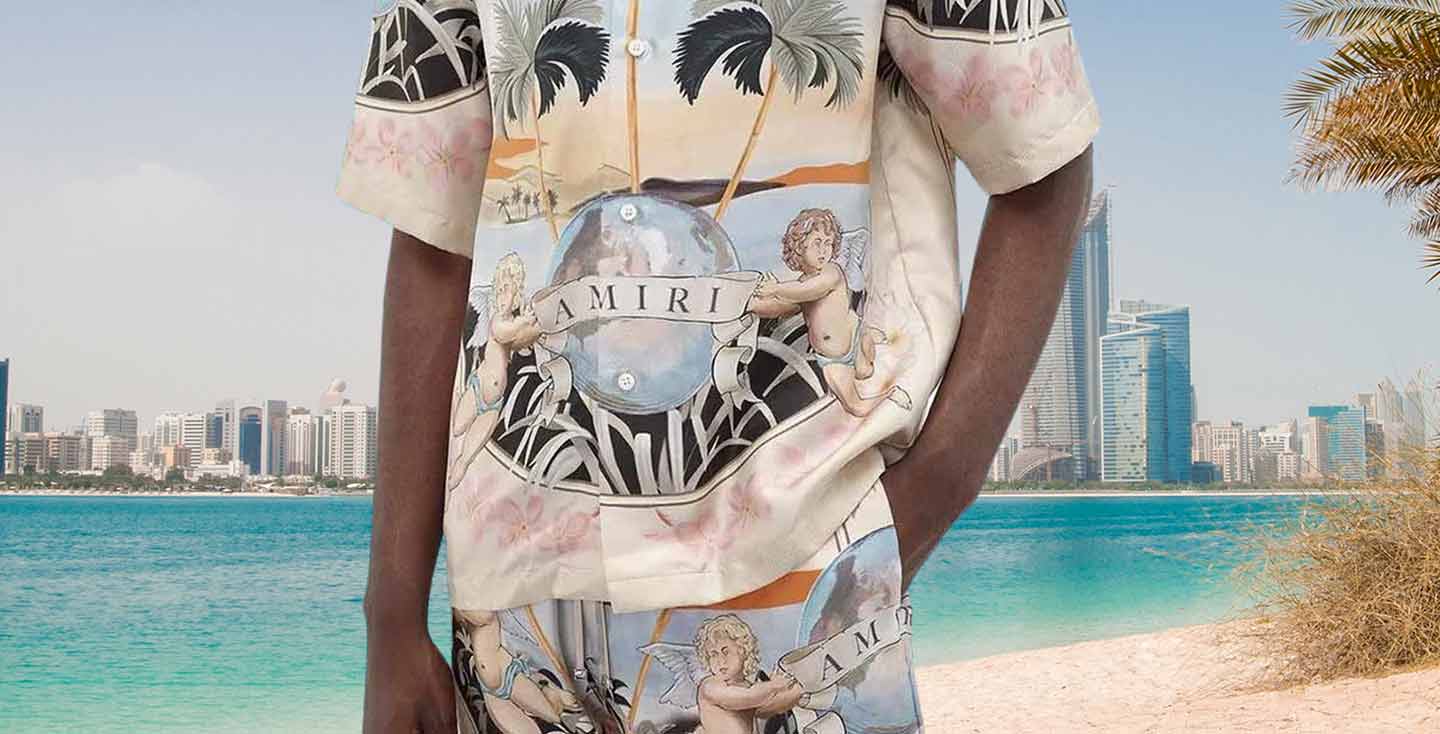 Experience the allure of the sun, sand, and swimwear with our curated selection of men's designer beachwear. Amiri Silk Shirt and Shorts set, Casablanca Silk Shirts, Christian Louboutin sandals